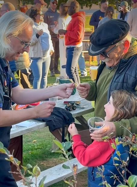 Christian performing at an outdoor event